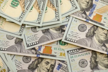 Background with money American hundred dollar bills. 100 dollar bills background