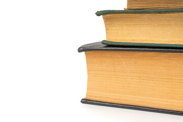 Old book stack pages texture. Vintage books background, antique library collection closeup