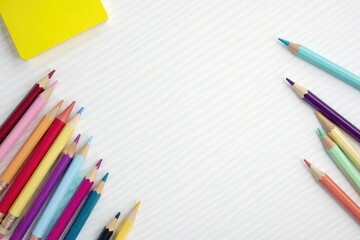 White background, scattered pencils and notepad , planning, writing