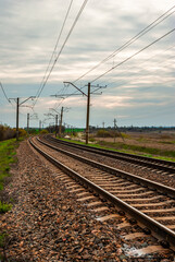 Fields and train around the forest , landscape photography with train and power electricity lines...
