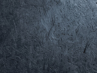 Dark particle board surface creating dramatic textured background wallpaper