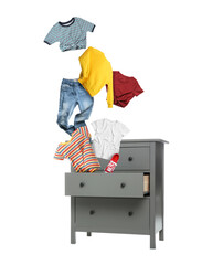 Clothes flying out of dresser on white background