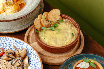 A girl smiles on a white background