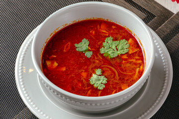A girl smiles on a white background