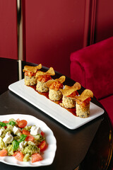 A girl smiles on a white background