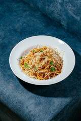 A girl smiles on a white background