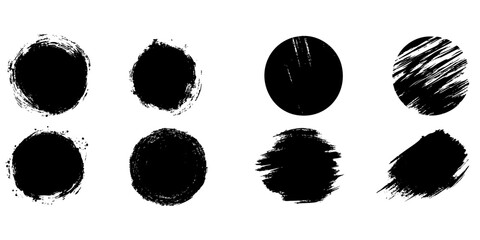 Artistic black brush strokes creating circular shapes on a white background
