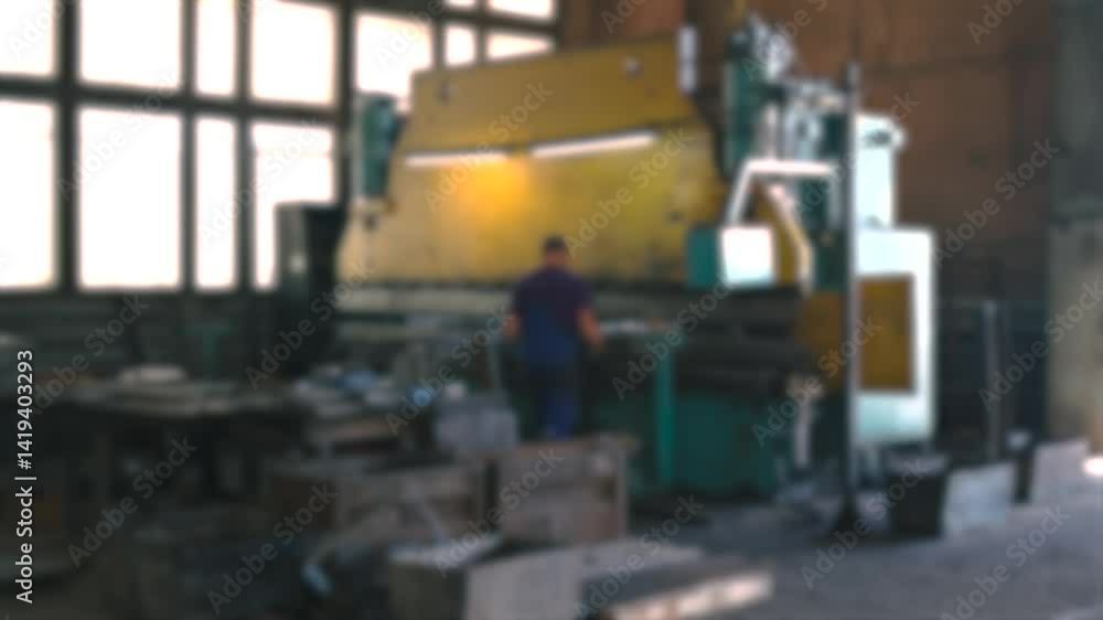 Poster in a busy workshop, a dedicated worker operates a press brake, meticulously shaping metal pieces wit