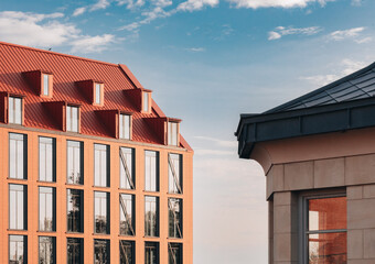 Contemporary Architecture with Contrasting Rooflines – Modern Urban Buildings in Warm Light