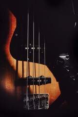 Details of a four-string bass guitar