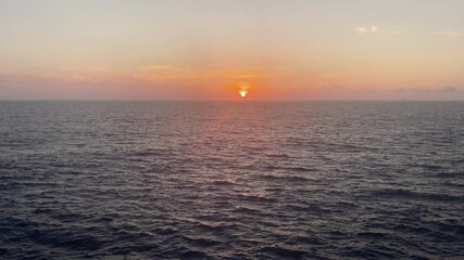 Sunset over the serene waters of Zakynthos, Greece, showcasing nature's beauty and tranquility at dusk