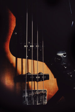 Details of a four-string bass guitar