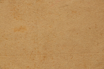 Old brown paper background close-up with stains,paper