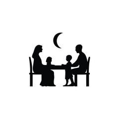 Silhouette of a Family Gathering Around a Table at Night