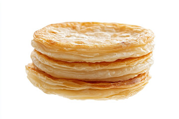 a stack of pancakes on a white surface