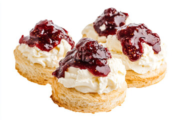three pastries with cream and jam on them