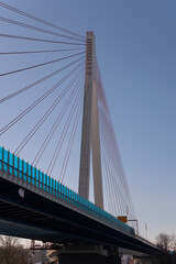 Cable-stayed bridge across the river Rhine near Neuwied spanning wide distance under blue sky