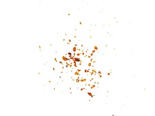 Dried red chili powder flying. Grainy scatterings of spicy burst . Splashes of red pepper...