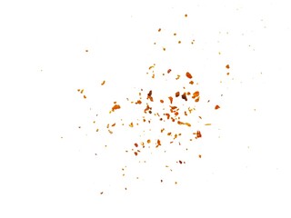 Dried red chili powder flying. Grainy scatterings of spicy burst . Splashes of red pepper powder.Overlay effect chilli or paprika spice splatters.