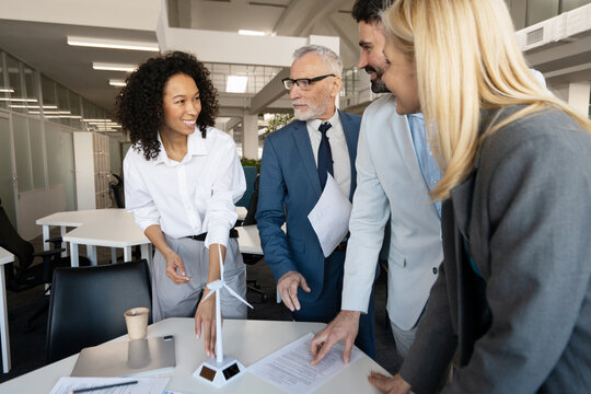 Diverse business team collaborating in modern office