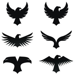 Obraz premium Minimalistic Black Eagle Silhouettes - Iconic Vector Design Collection.