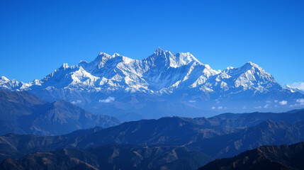Fototapeta premium Snowy Peaks with Blue Sky Backdrop