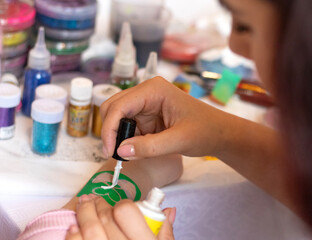 selective focus. decorative cosmetics for children and adults. holy Flash tattoo. Transfer tattoos...