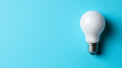 White Lightbulb on Blue Background