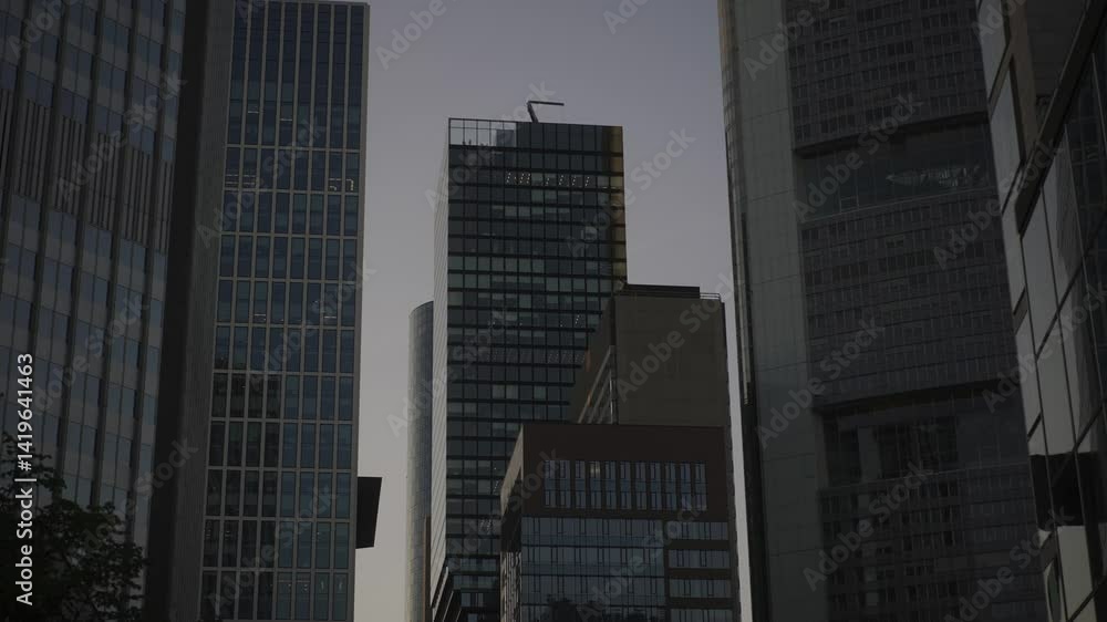Poster exploring modern architecture in frankfurt's skyline during twilight