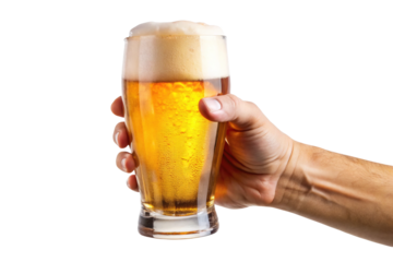 Hand holding a glass of golden beer with thick foamy head
