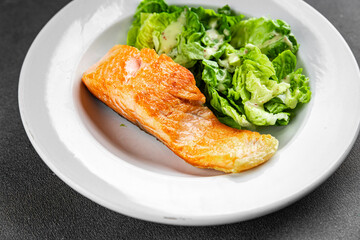 Salmon fried fish seafood dish fresh delicious gourmet food background on the table rustic food top view copy space keto paleo diet vegetarian food pescetarian diet