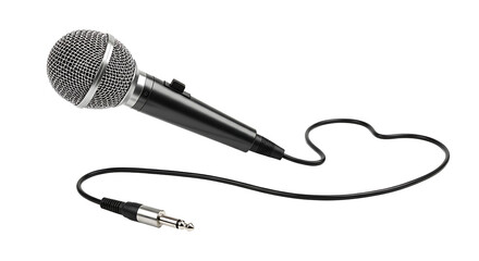 A close up shot of a black microphone with a cord on a black background in a studio setting
