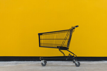 Minimalism style, Shopping cart and yellow wall.