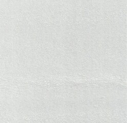 A soft white terry cloth texture, perfect for towels, bathrobes, or cozy fabric backgrounds.