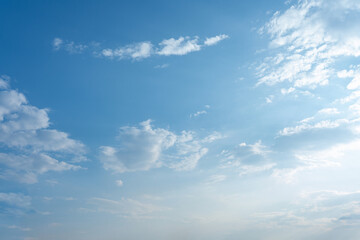 Fototapeta premium Serene Blue Sky with Scattered Cumulus Clouds Natural Daylight Scene