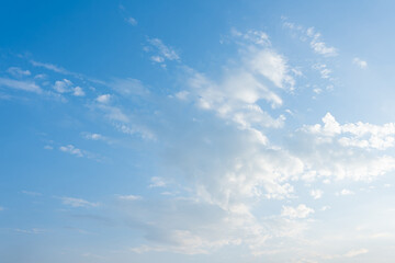 Serene Blue Sky with Scattered Cumulus Clouds Peaceful Nature Background Image