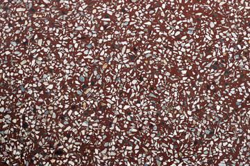Textured Red Terrazzo Floor With Marble and Stone Chips Pattern