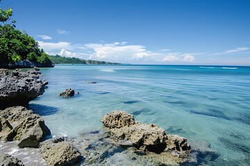 Vibrant Coastal Landscape With Turquoise Waters And Blue Sky Sunlight