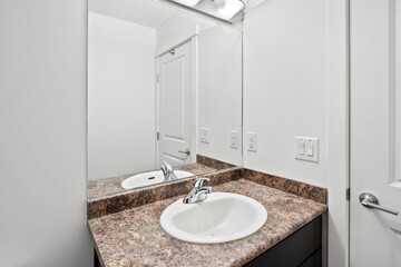 Bathroom with a sink and mirror