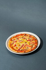 Tasty pizza on gray background, top view. Space for text