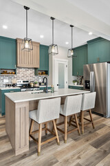 Kitchen with a green color theme and a modern design