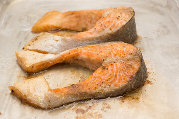 salmon fillets baked until crispy with parsley