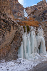 A Frozen Waterfall in Ladakh region - photographed on a trekking route during peak winter (India)