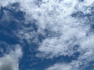 clear blue sky with pure white clouds. The sky was very clear and clouds were scattered everywhere