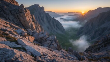Obraz premium Sunrise Over Mountain Valley with Fog and Rocky Cliffs
