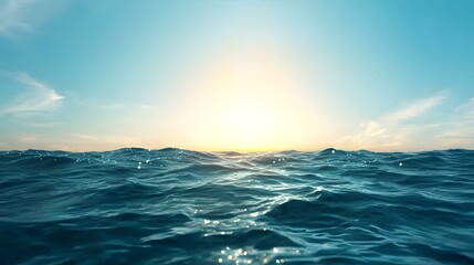 Obraz premium The image shows a serene ocean scene at sunset, with gently rolling waves reflecting the golden light.