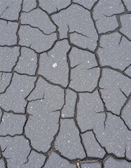Obraz premium Rough gray asphalt road texture, showing cracks and tire marks, shadow, driving, monotone