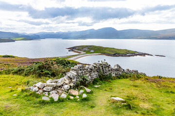 Ard Neackie Lime Kilns sit on a narrow strip of land in the Scottish Highlands, surrounded by Loch Eriboll&rsquo;s blue waters. A scenic and historic site where nature meets quiet industrial heritage.