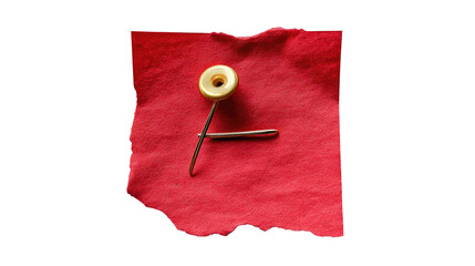 Safety Pin on Fabric: A close-up shot captures a pristine safety pin on vibrant red fabric. this image showcases its intricate design against the fabric.