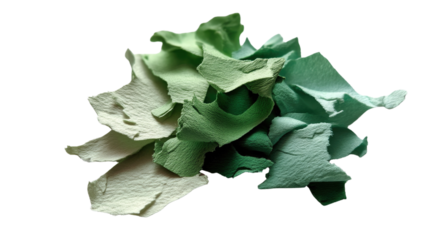 Recycled Paper Fragments: A close-up shot captures a pile of torn, recycled paper in varying shades of green, emphasizing the concept of sustainability and environmental consciousness.